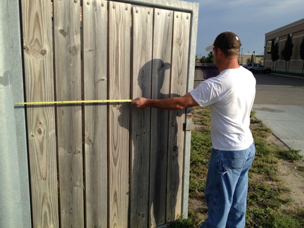 TRASH ENCLOSURE TO BE MODIFIED